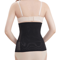 Corset amincissant noir avec bandes croisées, vue arrière, léger et glamour pour un effet taille fine.